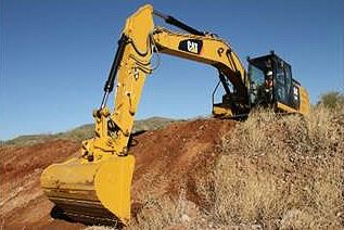 CAT Clean-up Bucket Attachment in Use