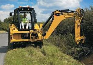 Cat® Ditch Cleaning Bucket Attachment in Use